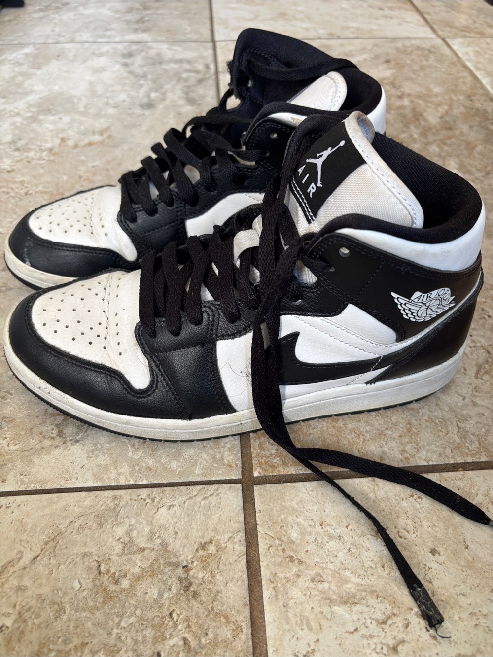 Jordan Air Retro High Top Sneakers in Black and White